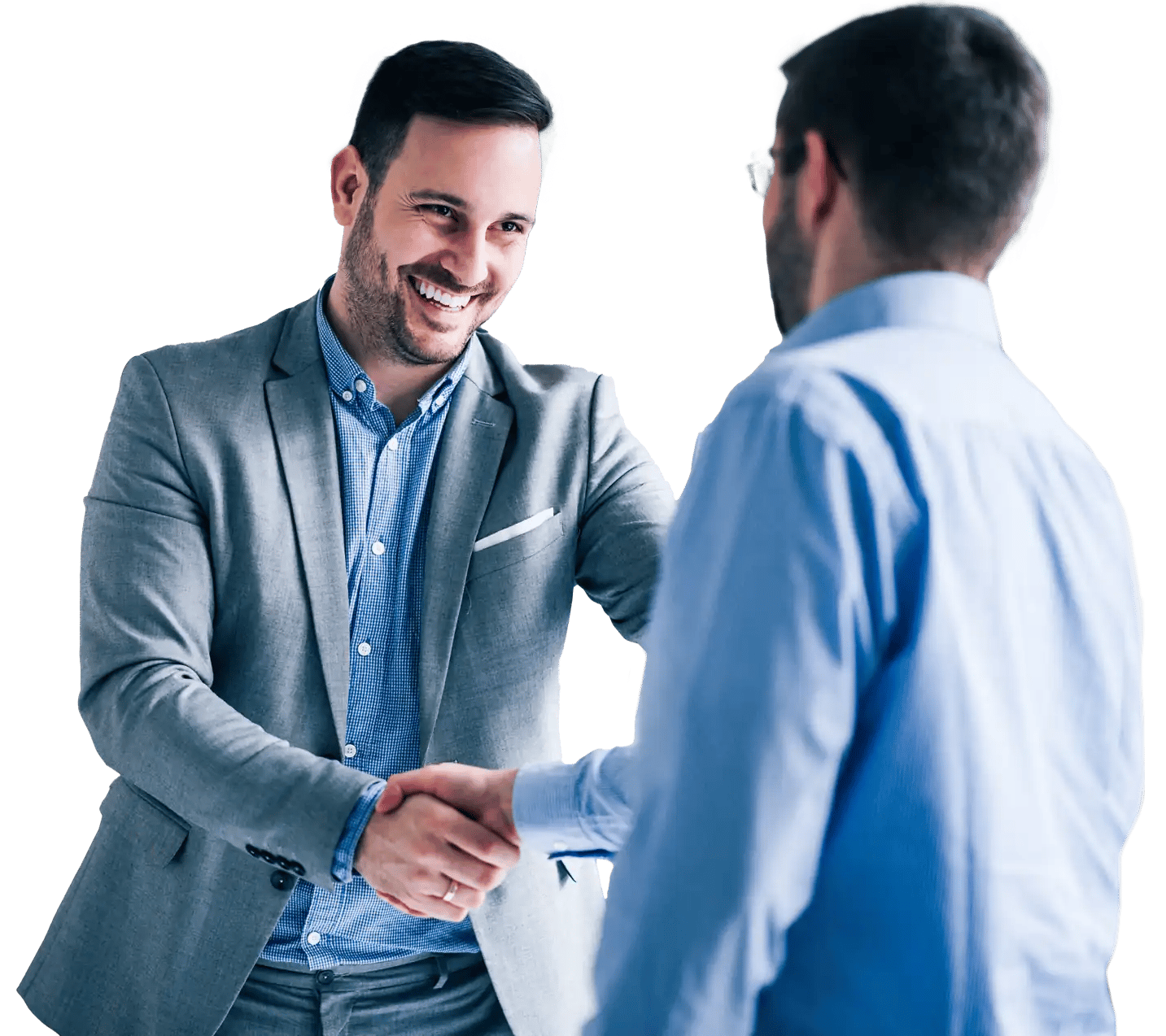 two-smiling-businessmen-shaking-hands-while-standing-office 2-1