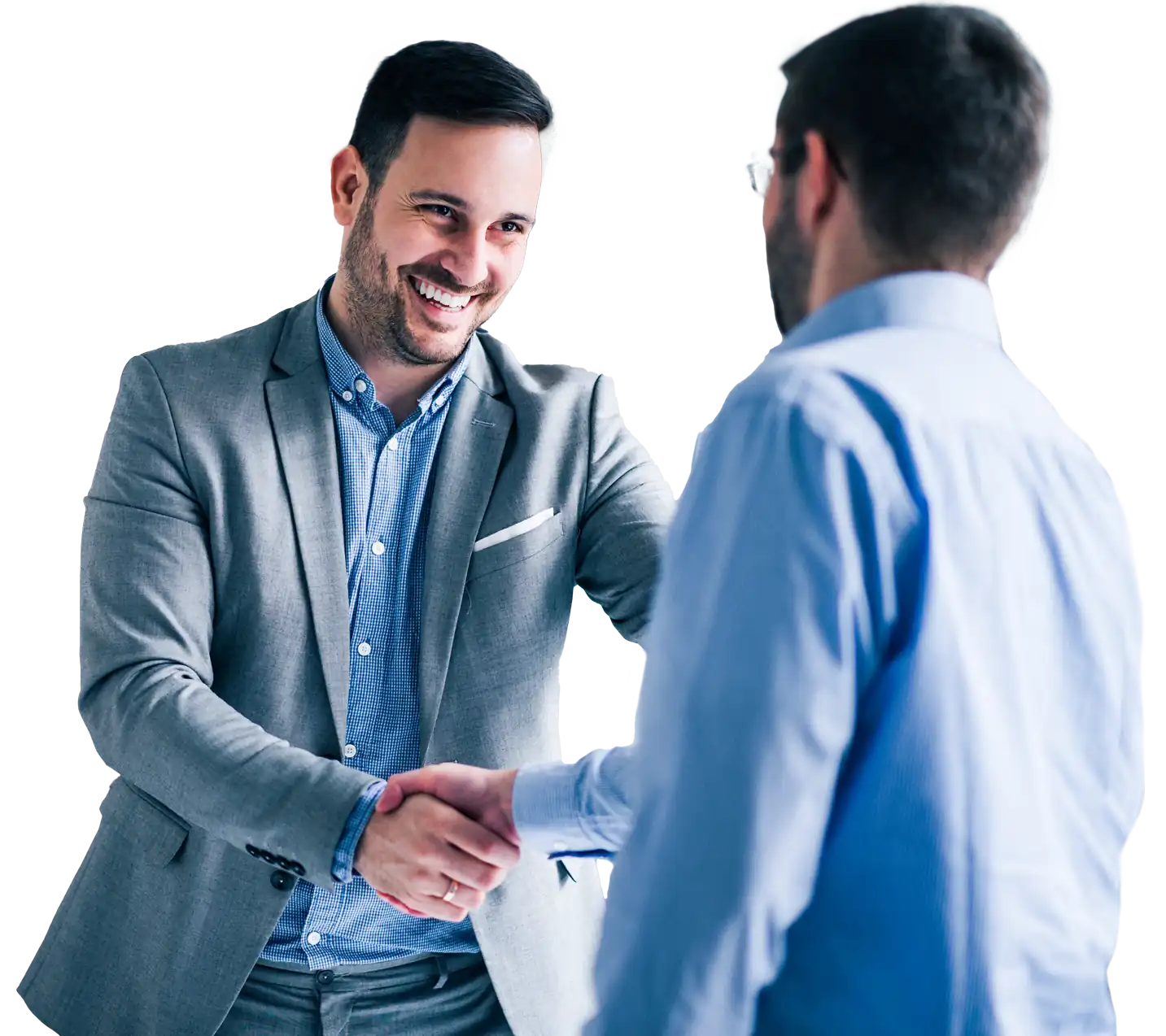 two-smiling-businessmen-shaking-hands-while-standing-office 2-1